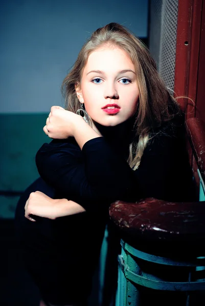 Stock image Attractive blond girl at stairs