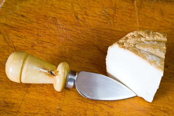 Smoked ricotta with cheese knife — Stock Photo, Image