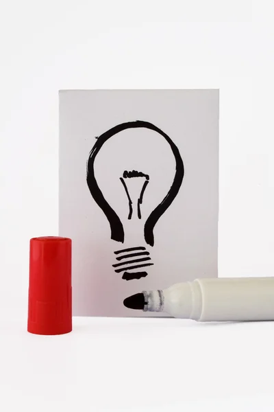 Drawing-pen and lightbulb — Stock Photo, Image