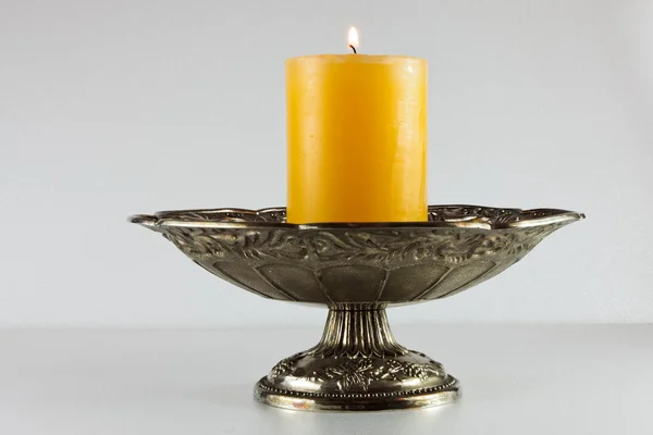 Burning, orange candle — Stock Photo, Image