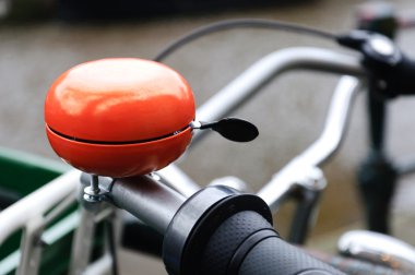 Orange bicycle bell clipart