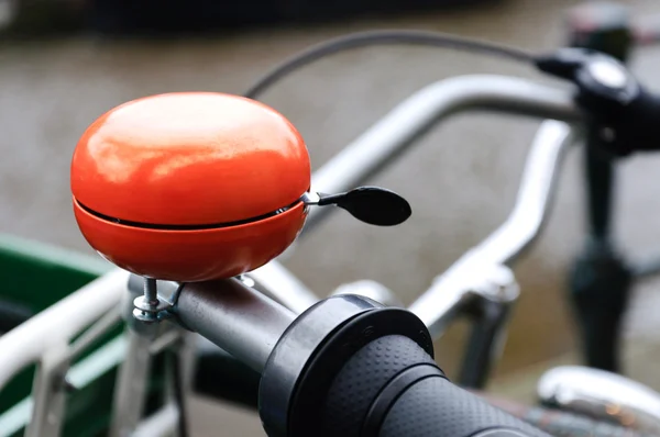Campana naranja bicicleta Fotos de stock
