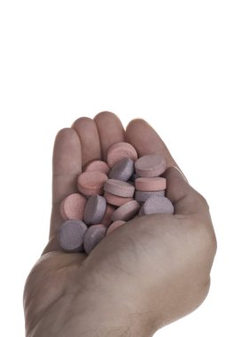 Handful of generic Antacid tablets clipart