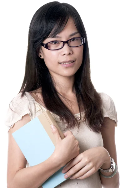 Mulher asiática segurando um livro — Fotografia de Stock