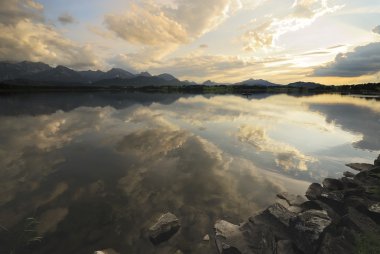 Sunset at an alpine lake clipart