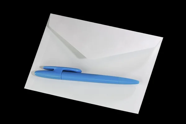 Carta sobre y biro —  Fotos de Stock