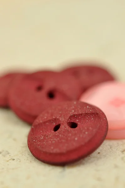 Botones rojo y rosa —  Fotos de Stock