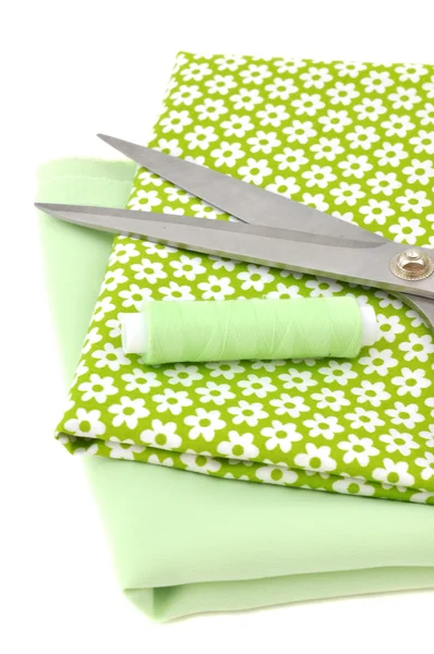 Sewing Items on Floral Cloth — Stockfoto