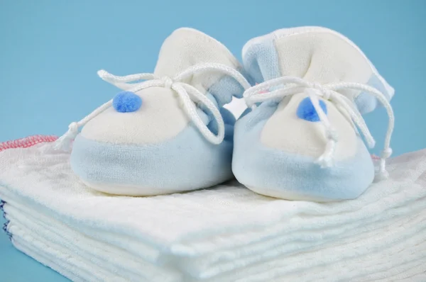 Baby Shoes on Cotton Diapers — Stock Photo, Image