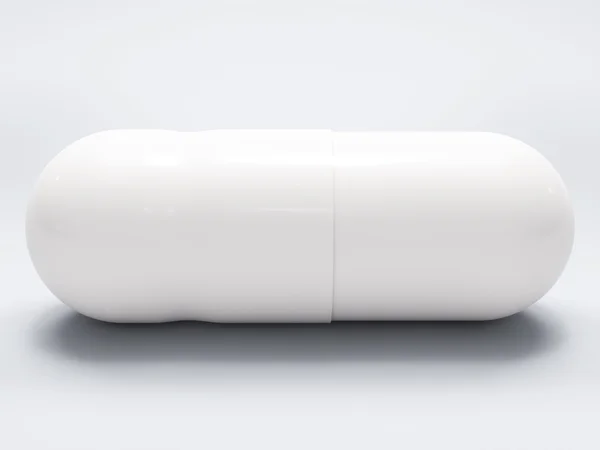 Pillola medica bianca su sfondo bianco — Foto Stock