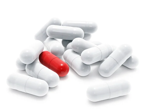 Branco e um comprimidos vermelhos no branco — Fotografia de Stock