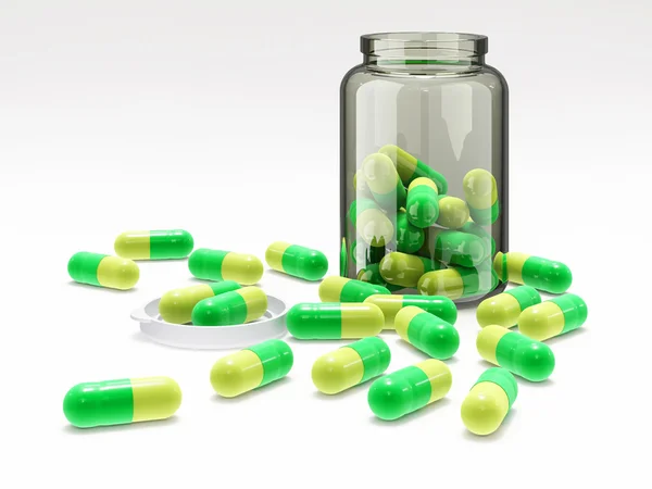 Pillole giallo-verdi in flacone medico con tappo — Foto Stock