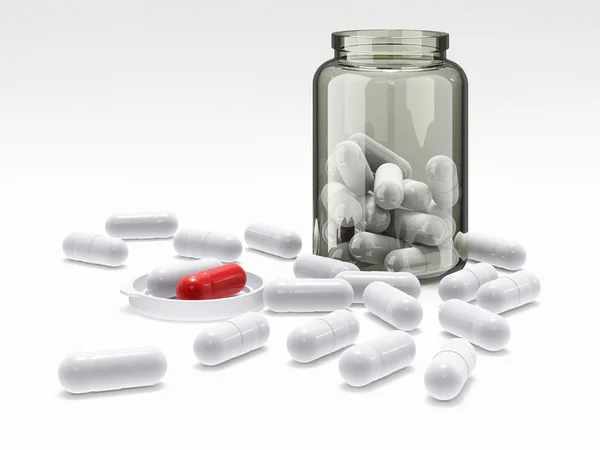 Píldoras blancas y rojas en frasco médico sobre blanco —  Fotos de Stock