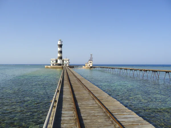 stock image Lighthouse on a tropical coral reef