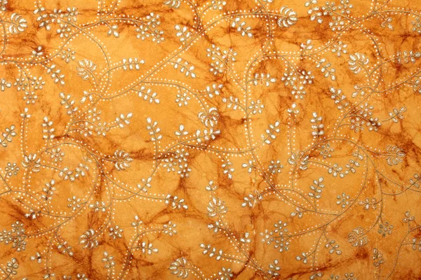 Orange brown handmade art paper with floral pattern — Stock Photo, Image