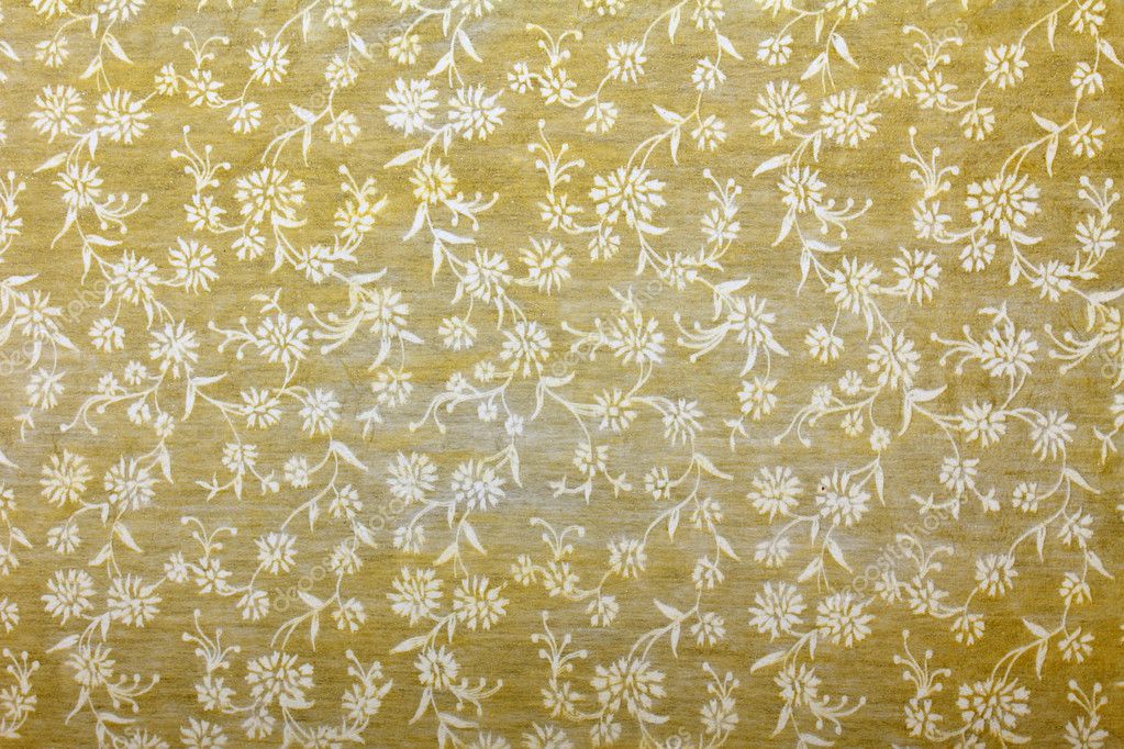 Golden handmade art paper with floral pattern — Stock Photo