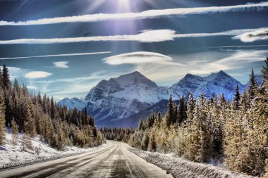 Ice road under a blue sky clipart