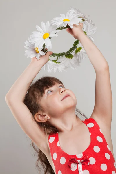 Girl holding a wreath — Stock Photo, Image