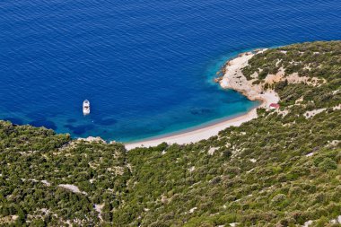 Crystal clean beach aerial view clipart