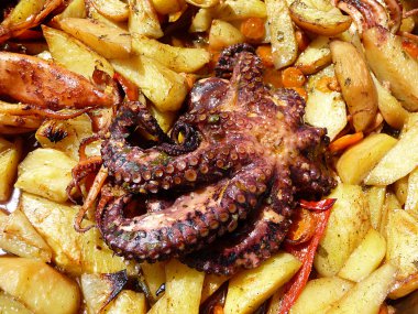 Octopussy with potato baked in olive oil clipart