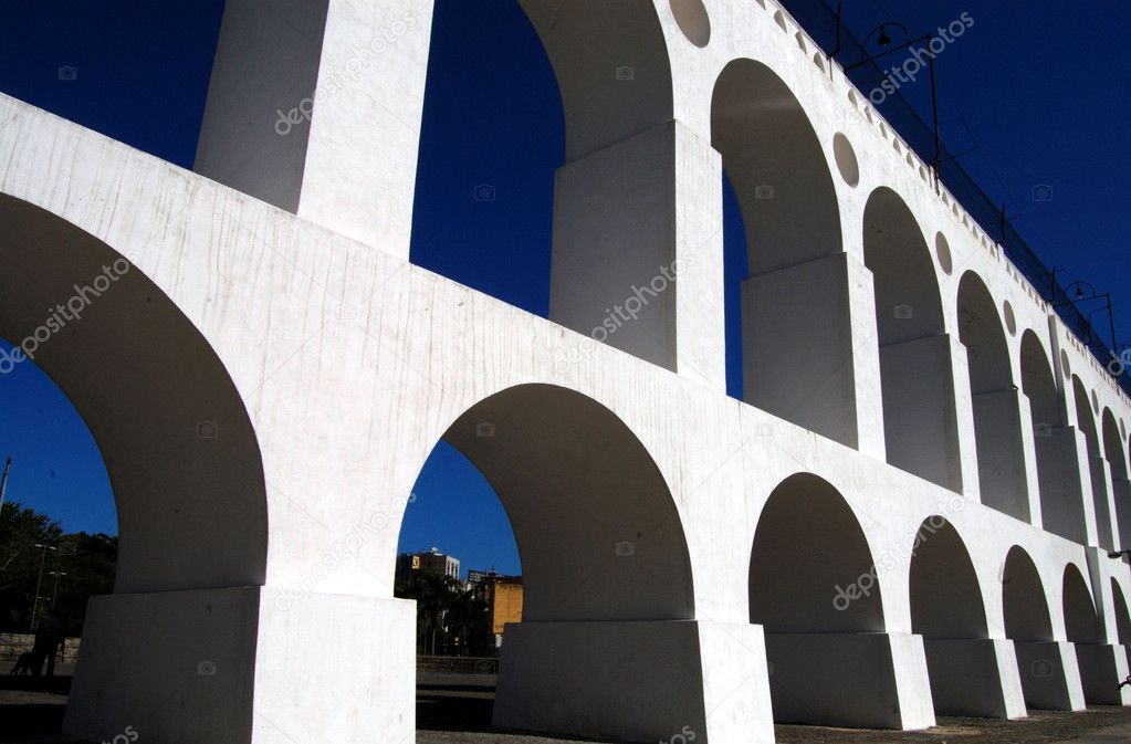 White aqueduct agains blue sky