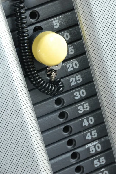 Focus on gym weight machine. Amount of weight on lifting machine. — Stock Photo, Image