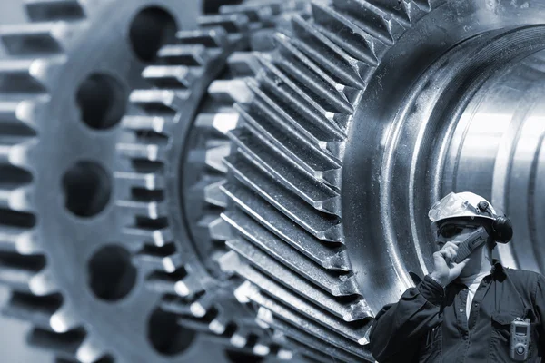 Engineer and gears machinery — Stock Photo, Image