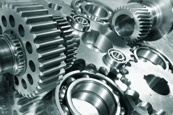 Engineering parts and gear wheels — Stock Photo, Image