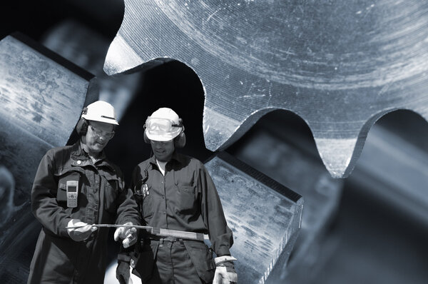 Steel workers and machinery