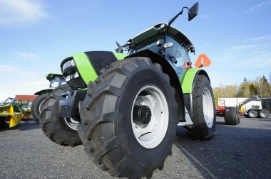 Giant farming tractor clipart