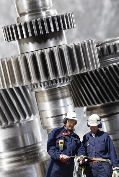 Engineers and nuclear machinery — Stock Photo, Image