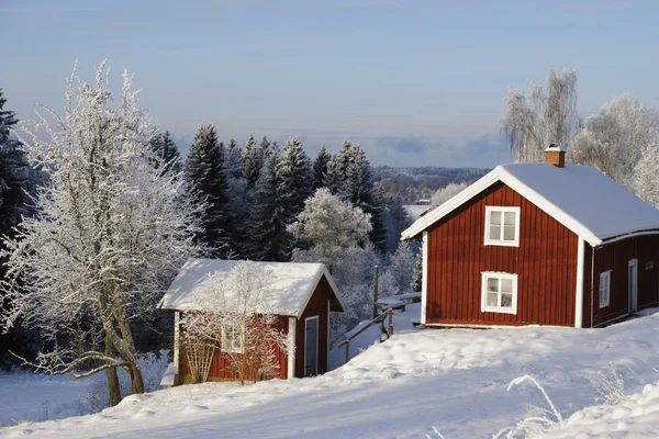 Casas vermelhas no tempo de inverno — Fotografia de Stock