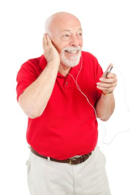 Senior Man Playing MP3s clipart