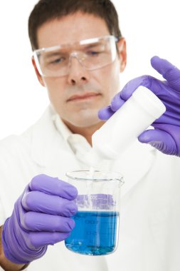 Scientist Mixes Compound Closeup clipart