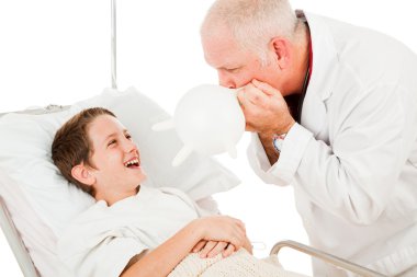 Boy Laughs at Doctor clipart