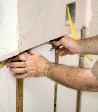 Electrician Wiring The Walls clipart