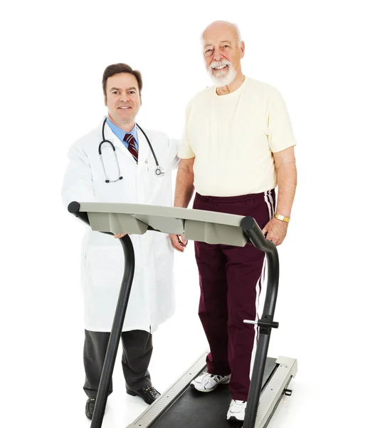 Ajuste hombre mayor con médico —  Fotos de Stock
