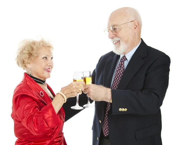 Senior přípitek šampaňským — Stock fotografie