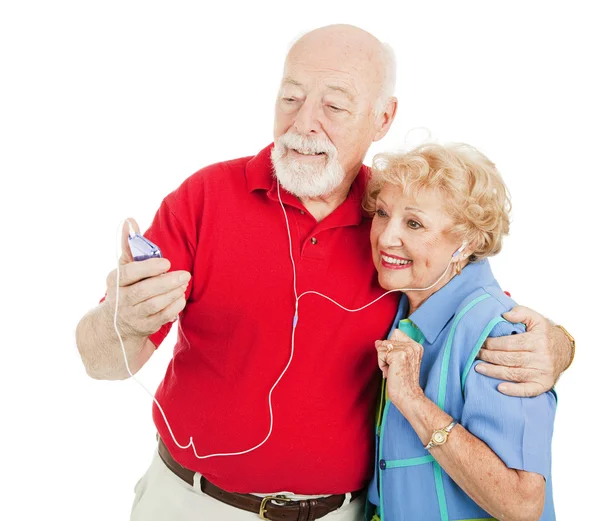 Senior Couple Listening to MP3s — Stock Photo, Image
