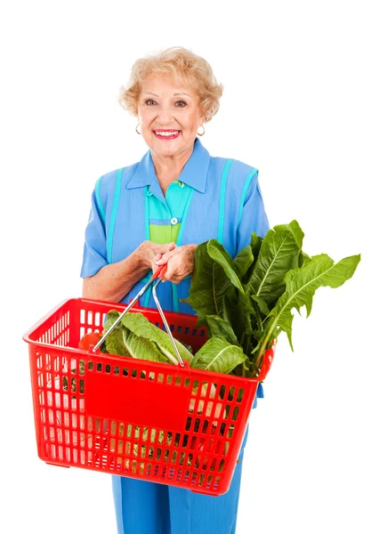 Starší dáma s nákupy — Stock fotografie