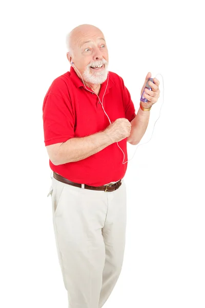 Idősebb ember élvezi dallamok — Stock Fotó