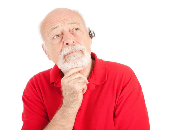 Senior man luisteren — Stockfoto