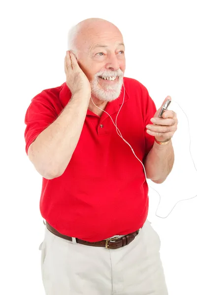 Uomo anziano giocare MP3s — Foto Stock
