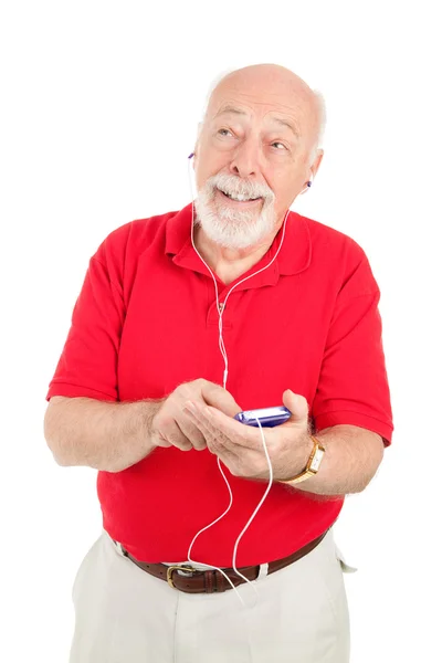 Старший чоловік з MP3 плеєром — стокове фото