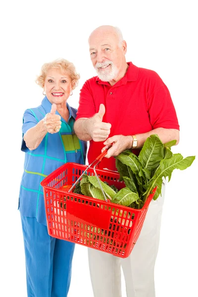 Acheteurs seniors donnent pouces levés — Photo