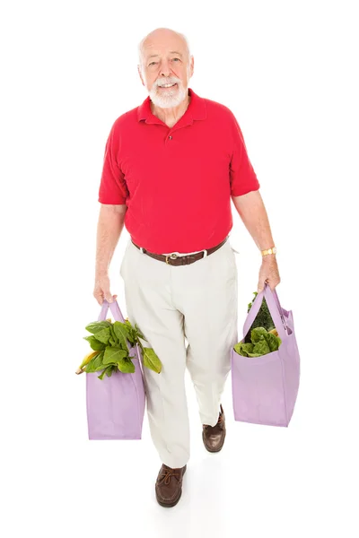 Sênior com sacos de supermercado reutilizáveis — Fotografia de Stock
