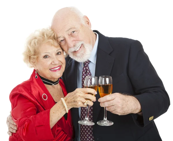 Senioren toast met champagne — Stockfoto