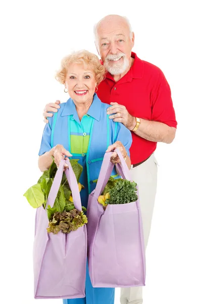 高齢者や再利用可能なショッピング バッグ — ストック写真