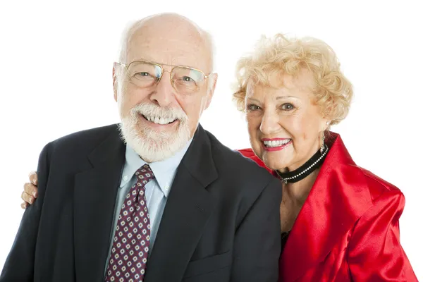 Успешная улыбающаяся старшая пара — стоковое фото