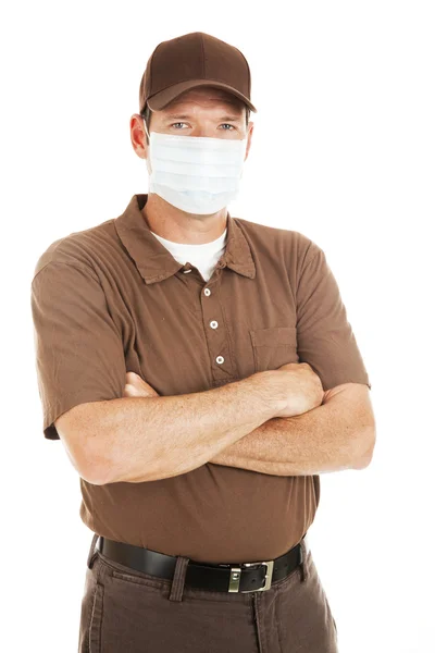 Homem de entrega vestindo máscara de gripe — Fotografia de Stock